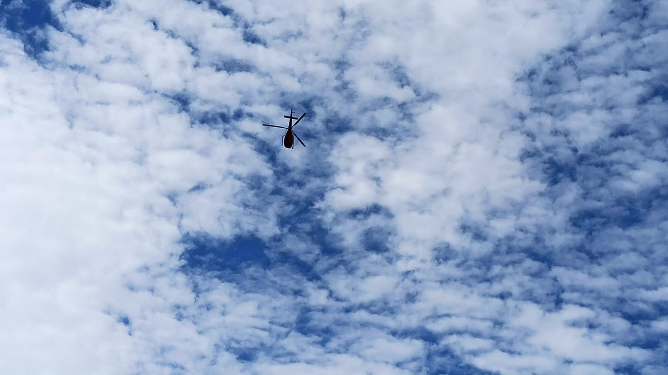बिरामी बोकेर उडेको सिम्रिक एयरको हेलिकप्टर। तस्वीर: दानबहादुर गुरूङ।