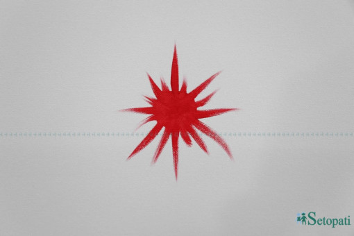 गोदावरीमा भएको एमाले विधान महाधिवेशनमा पार्टीनिकट ललितकला संघले पेन्ट गरेको पार्टी चिह्न। फाइल।